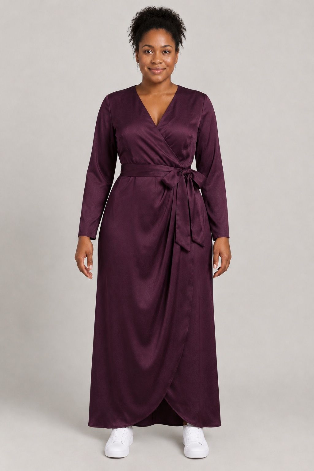 Amara wearing the satin wrap dress after the try-on