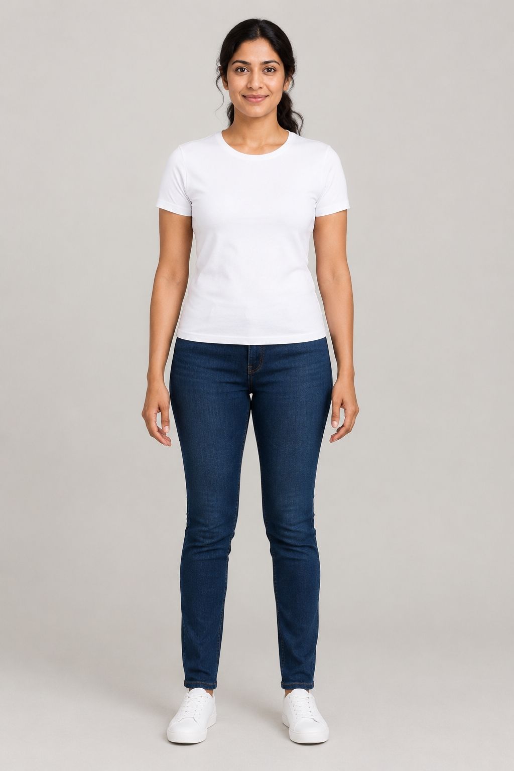 Priya, an AI model, in a white T-shirt and jeans